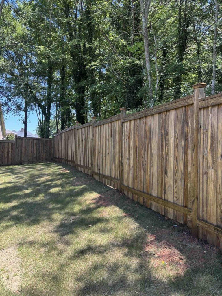 Wood fenced backyard in Guntersville